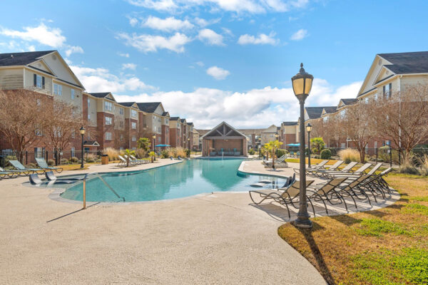 Second resort-style pool with lounge chairs at The Overlook student apartments near SFA Nacogdoches